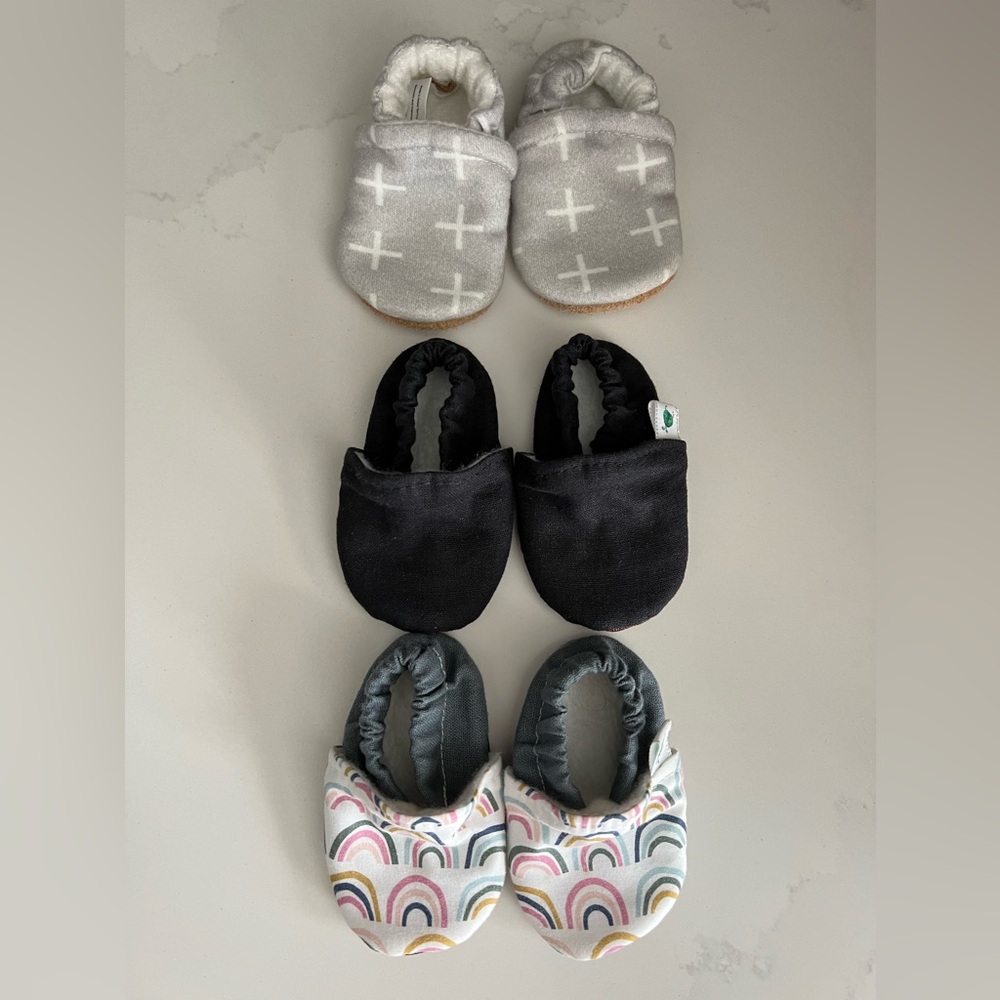 Newborn Crib shoes. Two new, one used.